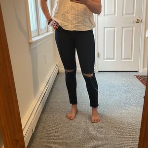 Carly Jean Los Angeles dark wash high rise skinny jean with distressed knees